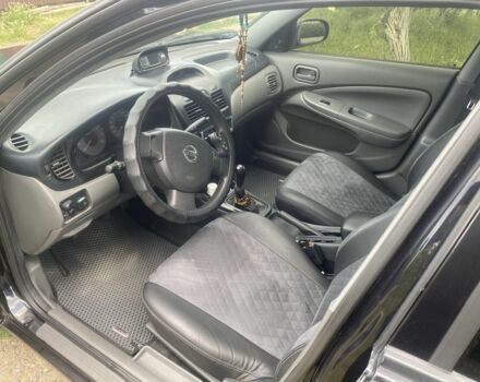 Черный Ниссан Альмера Классик, объемом двигателя 1.6 л и пробегом 157 тыс. км за 5000 $, фото 5 на Automoto.ua