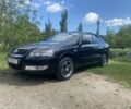 Черный Ниссан Альмера Классик, объемом двигателя 1.6 л и пробегом 157 тыс. км за 5600 $, фото 1 на Automoto.ua