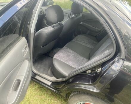 Черный Ниссан Альмера Классик, объемом двигателя 1.6 л и пробегом 157 тыс. км за 5000 $, фото 7 на Automoto.ua