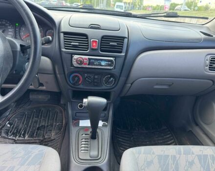 Сірий Ніссан Альмера Класік, об'ємом двигуна 1.8 л та пробігом 136 тис. км за 4000 $, фото 8 на Automoto.ua