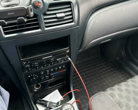 Сірий Ніссан Альмера Класік, об'ємом двигуна 1.6 л та пробігом 261 тис. км за 2700 $, фото 17 на Automoto.ua