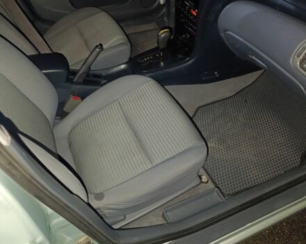 Серый Ниссан Альмера Классик, объемом двигателя 1.6 л и пробегом 271 тыс. км за 4700 $, фото 5 на Automoto.ua