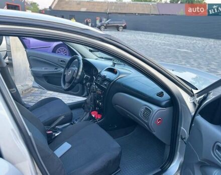 Сірий Ніссан Альмера Класік, об'ємом двигуна 1.6 л та пробігом 95 тис. км за 6600 $, фото 11 на Automoto.ua