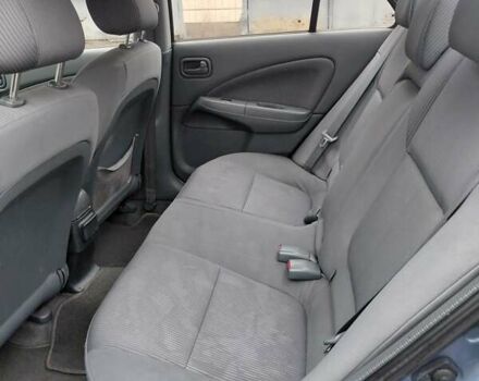 Синий Ниссан Альмера Классик, объемом двигателя 1.6 л и пробегом 218 тыс. км за 4800 $, фото 19 на Automoto.ua