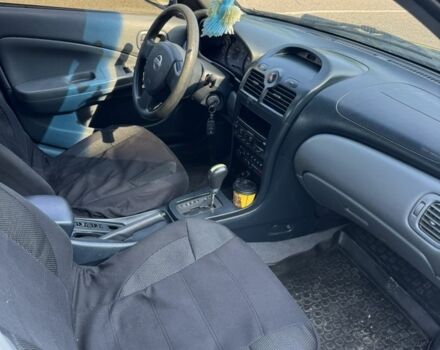 Синий Ниссан Альмера Классик, объемом двигателя 1.6 л и пробегом 170 тыс. км за 3900 $, фото 4 на Automoto.ua