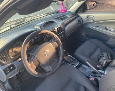 Синій Ніссан Альмера Класік, об'ємом двигуна 1.6 л та пробігом 253 тис. км за 4700 $, фото 6 на Automoto.ua