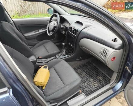 Синій Ніссан Альмера Класік, об'ємом двигуна 1.6 л та пробігом 191 тис. км за 4200 $, фото 11 на Automoto.ua