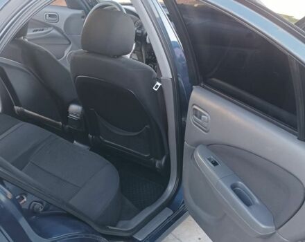 Синий Ниссан Альмера Классик, объемом двигателя 1.6 л и пробегом 227 тыс. км за 4500 $, фото 14 на Automoto.ua