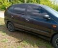 Чорний Ніссан Альмера Тіна, об'ємом двигуна 2.2 л та пробігом 390 тис. км за 4500 $, фото 9 на Automoto.ua