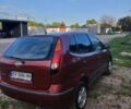 Красный Ниссан Альмера Тино, объемом двигателя 1.8 л и пробегом 300 тыс. км за 2700 $, фото 4 на Automoto.ua