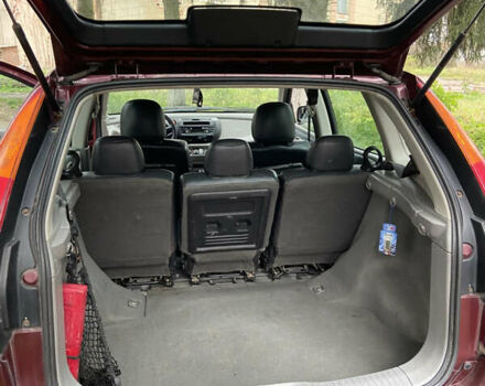 Красный Ниссан Альмера Тино, объемом двигателя 1.77 л и пробегом 226 тыс. км за 3552 $, фото 20 на Automoto.ua