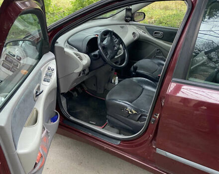 Красный Ниссан Альмера Тино, объемом двигателя 1.77 л и пробегом 226 тыс. км за 3552 $, фото 12 на Automoto.ua