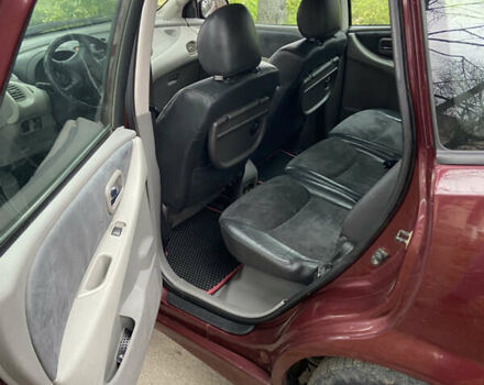 Красный Ниссан Альмера Тино, объемом двигателя 1.77 л и пробегом 226 тыс. км за 3552 $, фото 13 на Automoto.ua