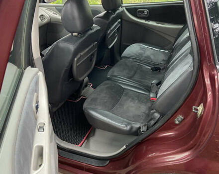 Красный Ниссан Альмера Тино, объемом двигателя 1.77 л и пробегом 226 тыс. км за 3552 $, фото 19 на Automoto.ua