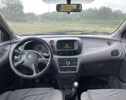 Серый Ниссан Альмера Тино, объемом двигателя 1.8 л и пробегом 370 тыс. км за 2600 $, фото 5 на Automoto.ua