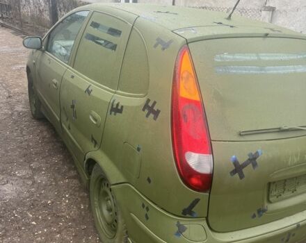 Синий Ниссан Альмера Тино, объемом двигателя 2.2 л и пробегом 250 тыс. км за 1000 $, фото 1 на Automoto.ua