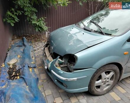 Зелений Ніссан Альмера Тіна, об'ємом двигуна 1.8 л та пробігом 190 тис. км за 2500 $, фото 4 на Automoto.ua