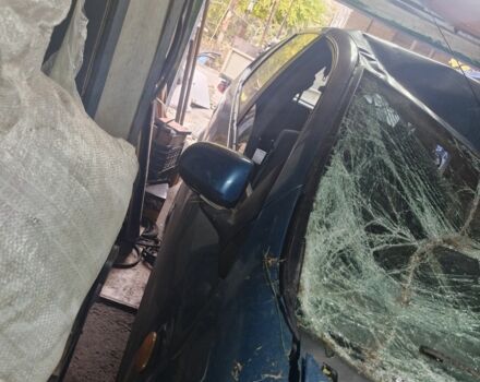 Зелений Ніссан Альмера Тіна, об'ємом двигуна 2 л та пробігом 101 тис. км за 1000 $, фото 7 на Automoto.ua