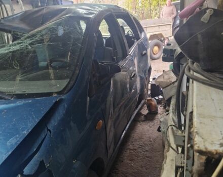 Зелений Ніссан Альмера Тіна, об'ємом двигуна 2 л та пробігом 101 тис. км за 1000 $, фото 6 на Automoto.ua