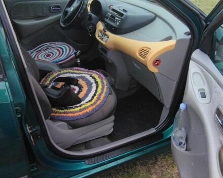 Зеленый Ниссан Альмера Тино, объемом двигателя 2.2 л и пробегом 350 тыс. км за 2100 $, фото 3 на Automoto.ua