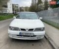 Белый Ниссан Альмера, объемом двигателя 1.6 л и пробегом 245 тыс. км за 1000 $, фото 1 на Automoto.ua