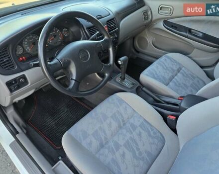 Білий Ніссан Альмера, об'ємом двигуна 1.6 л та пробігом 94 тис. км за 4999 $, фото 19 на Automoto.ua