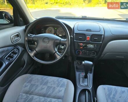 Білий Ніссан Альмера, об'ємом двигуна 1.6 л та пробігом 94 тис. км за 4999 $, фото 22 на Automoto.ua