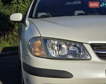 Білий Ніссан Альмера, об'ємом двигуна 1.6 л та пробігом 94 тис. км за 4999 $, фото 9 на Automoto.ua