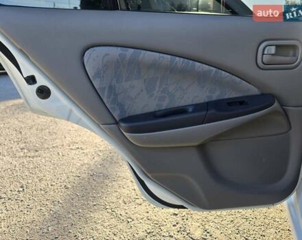Білий Ніссан Альмера, об'ємом двигуна 1.6 л та пробігом 94 тис. км за 4999 $, фото 35 на Automoto.ua
