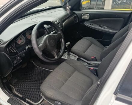 Белый Ниссан Альмера, объемом двигателя 1.8 л и пробегом 214 тыс. км за 3088 $, фото 2 на Automoto.ua