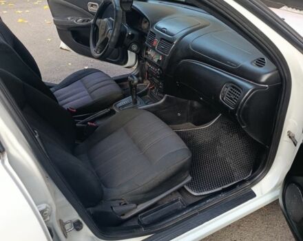 Белый Ниссан Альмера, объемом двигателя 1.8 л и пробегом 214 тыс. км за 3088 $, фото 3 на Automoto.ua