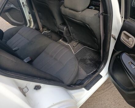 Белый Ниссан Альмера, объемом двигателя 1.8 л и пробегом 214 тыс. км за 3088 $, фото 4 на Automoto.ua