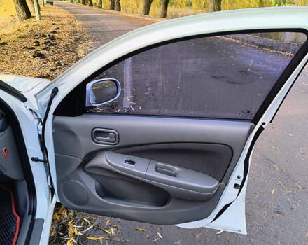 Белый Ниссан Альмера, объемом двигателя 1.6 л и пробегом 144 тыс. км за 6200 $, фото 19 на Automoto.ua