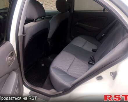 Белый Ниссан Альмера, объемом двигателя 1.6 л и пробегом 225 тыс. км за 4200 $, фото 7 на Automoto.ua