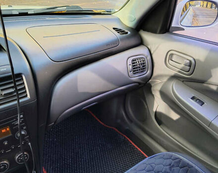 Белый Ниссан Альмера, объемом двигателя 1.6 л и пробегом 144 тыс. км за 6200 $, фото 9 на Automoto.ua