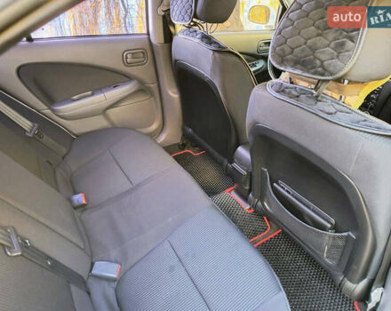 Белый Ниссан Альмера, объемом двигателя 1.6 л и пробегом 144 тыс. км за 6200 $, фото 15 на Automoto.ua