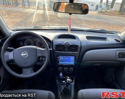Белый Ниссан Альмера, объемом двигателя 1.6 л и пробегом 330 тыс. км за 3799 $, фото 11 на Automoto.ua