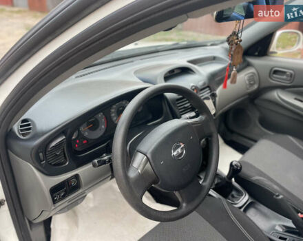 Білий Ніссан Альмера, об'ємом двигуна 1.6 л та пробігом 106 тис. км за 5600 $, фото 18 на Automoto.ua