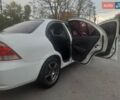 Белый Ниссан Альмера, объемом двигателя 1.6 л и пробегом 204 тыс. км за 4800 $, фото 7 на Automoto.ua