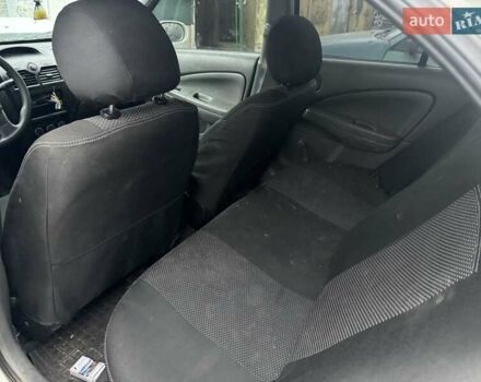 Белый Ниссан Альмера, объемом двигателя 1.6 л и пробегом 200 тыс. км за 1650 $, фото 9 на Automoto.ua