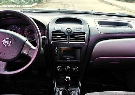 Белый Ниссан Альмера, объемом двигателя 1.6 л и пробегом 212 тыс. км за 4600 $, фото 7 на Automoto.ua