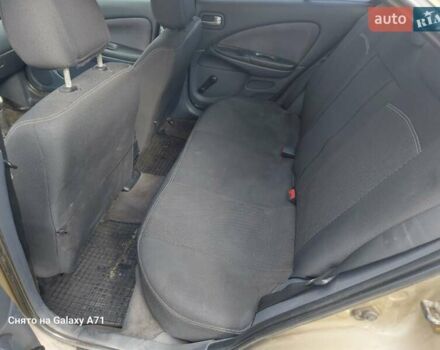 Бежевый Ниссан Альмера, объемом двигателя 1.5 л и пробегом 297 тыс. км за 2200 $, фото 4 на Automoto.ua