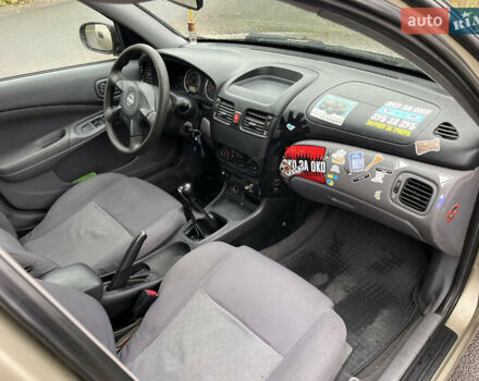 Бежевый Ниссан Альмера, объемом двигателя 1.5 л и пробегом 268 тыс. км за 2799 $, фото 10 на Automoto.ua