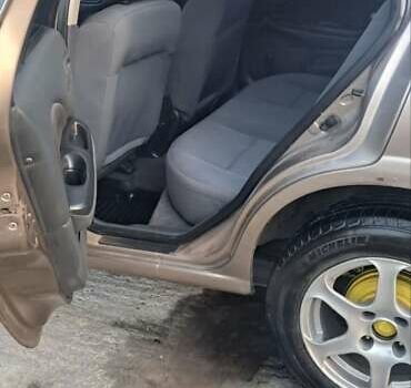 Бежевый Ниссан Альмера, объемом двигателя 1.5 л и пробегом 315 тыс. км за 3100 $, фото 4 на Automoto.ua