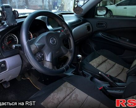 Бежевий Ніссан Альмера, об'ємом двигуна 1.8 л та пробігом 297 тис. км за 3600 $, фото 9 на Automoto.ua