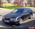 Черный Ниссан Альмера, объемом двигателя 1.4 л и пробегом 222 тыс. км за 950 $, фото 1 на Automoto.ua