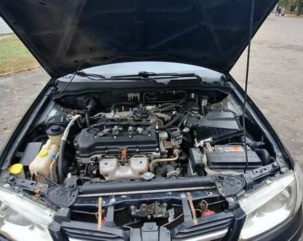 Черный Ниссан Альмера, объемом двигателя 1.5 л и пробегом 243 тыс. км за 2700 $, фото 7 на Automoto.ua