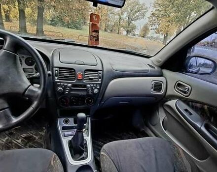 Черный Ниссан Альмера, объемом двигателя 1.5 л и пробегом 243 тыс. км за 2700 $, фото 6 на Automoto.ua