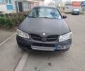 Черный Ниссан Альмера, объемом двигателя 0 л и пробегом 373 тыс. км за 1800 $, фото 1 на Automoto.ua