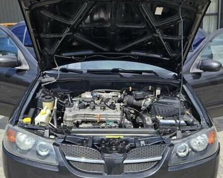 Чорний Ніссан Альмера, об'ємом двигуна 1.5 л та пробігом 244 тис. км за 3700 $, фото 15 на Automoto.ua